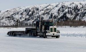 ice road truck, traffic on ice road, income of a ice road trucker, flatbed truck on ice road, ice road trucking 